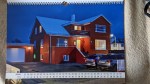 Januar Unsere erste Unterkunft in Grindavík, Heimagisting Bork, in der Dämmerung schön beleuchtet. Ein rotes Haus mit ebensolcher Garage und weißem Dach, mit gemütlich beleuchteten Fenstern