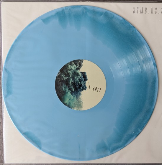 Hellblaue Vinyl-LP von SYMBIOSIS von NORDIC GIANTS Side A