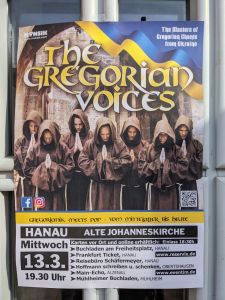 Plakat Auf dem Plakat sind 7 Männer in Gebetshaltung und Mönchskutten zu sehen. Auf dem Plakat steht: "The Gregorian Voices" - The Masters of Gregorian Chants from Ukraine Gregorianik meets Pop - Vom Mittelalter bis heute Hanau - Alte Johanniskirche Mittwoch 13.3. - 19:30 Uhr