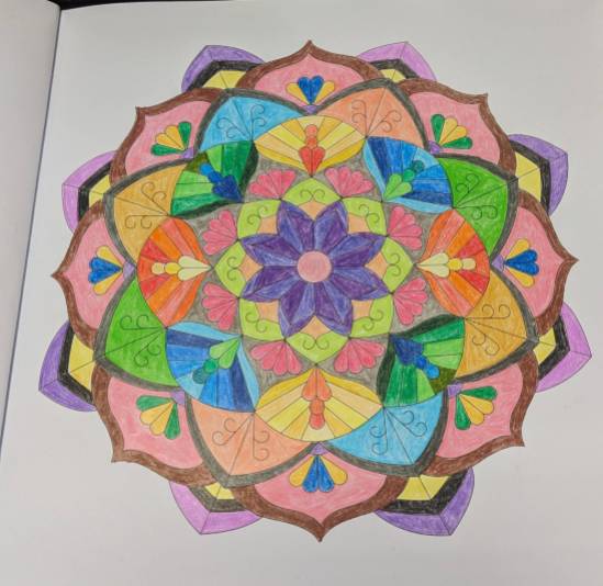 Mandala von vorher ausgemalt